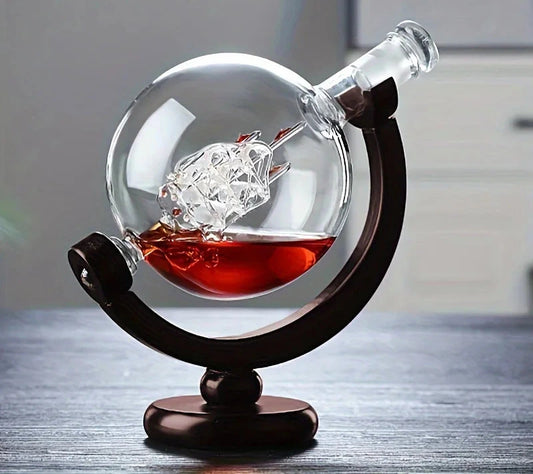Globe Whiskey Decanter Set — hand-blown glass globe with ship inside on dark wood stand