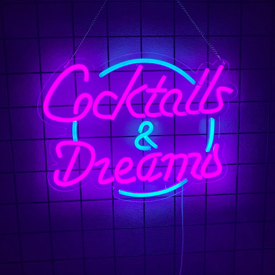 Cocktails and Dreams script LED neon sign in pink and blue